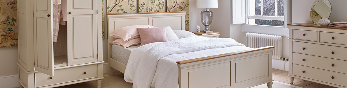 Bedroom with cream painted oak furniture