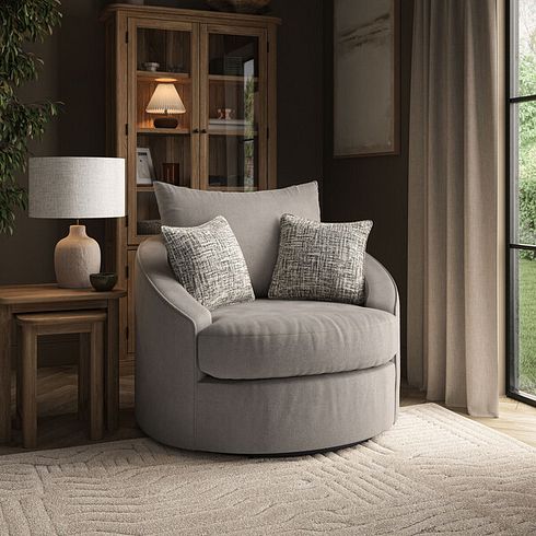 Elston Swivel Cuddler Chair in Penny Clay Fabric