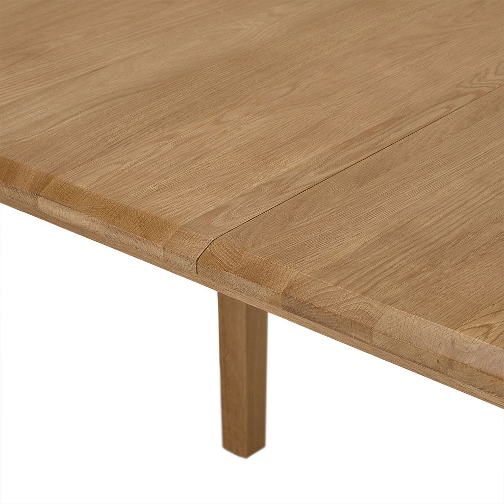 Corton Natural Oak Oval Extending Dining Table 160-200cm + 4 Kingham Natural Oak Spindle Chairs 8