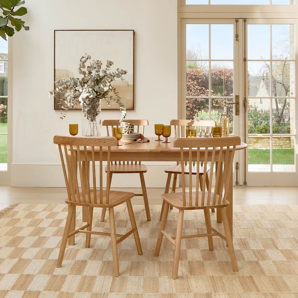 Corton Natural Oak Oval Extending Dining Table 160-200cm + 4 Kingham Natural Oak Spindle Chairs 2