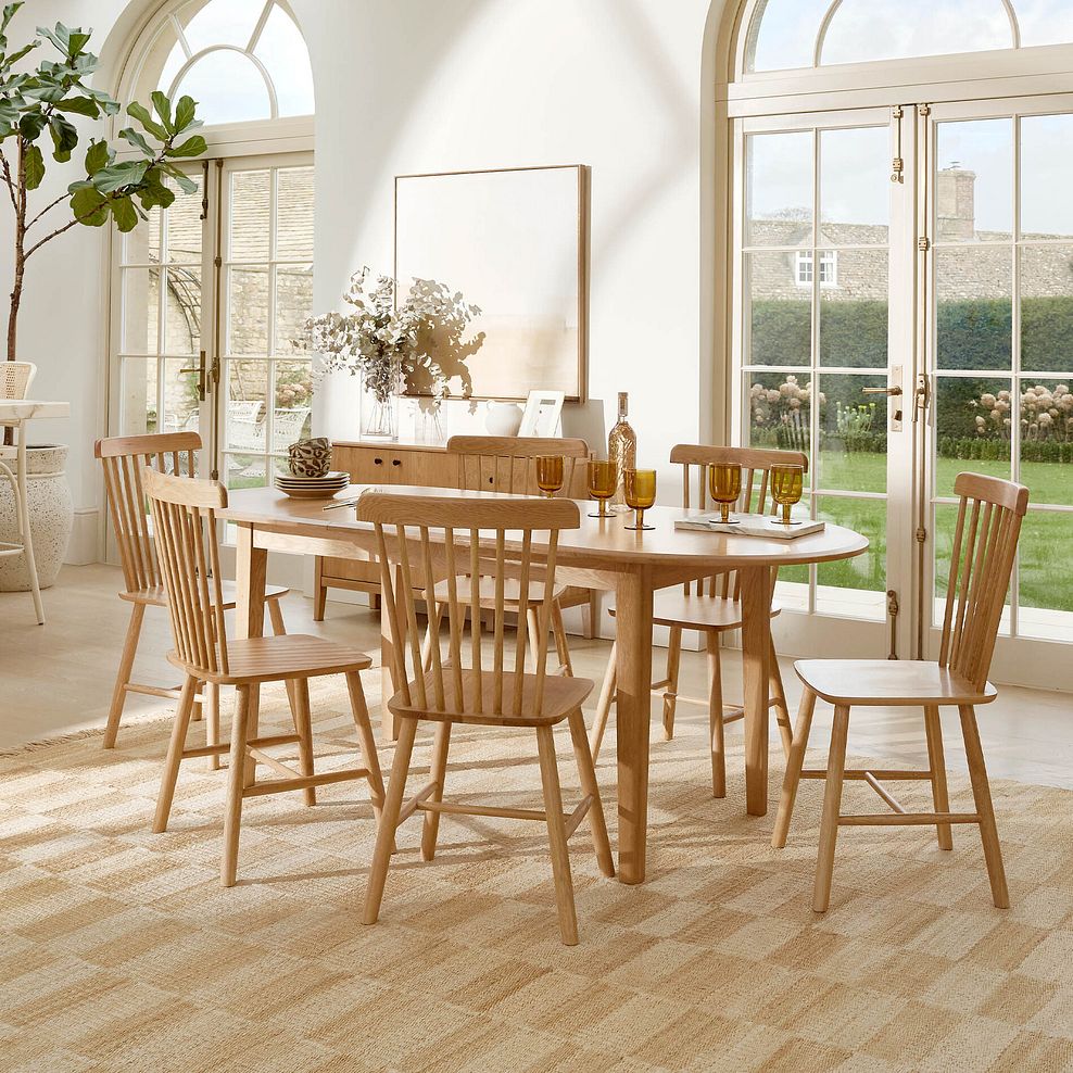 Corton Natural Oak Oval Extending Dining Table 160-200cm + 6 Kingham Natural Oak Spindle Chair 1