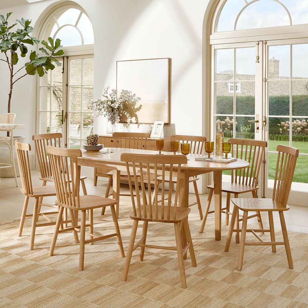 Corton Natural Oak Oval Extending Dining Table 160-200cm + 8 Kingham Natural Oak Spindle Chair 1