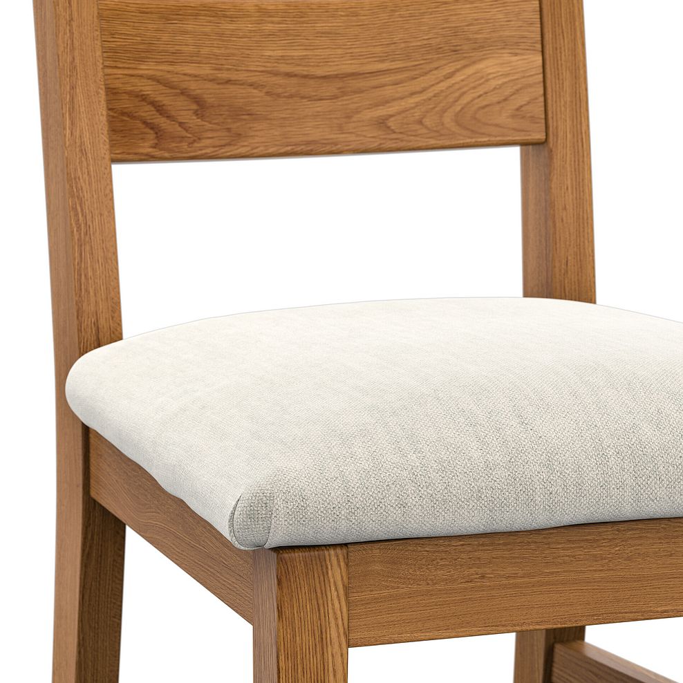 Hercules Rustic Extending Dining Table and 6 Linear Rustic Oak Chair with Verona Cream Fabric 7