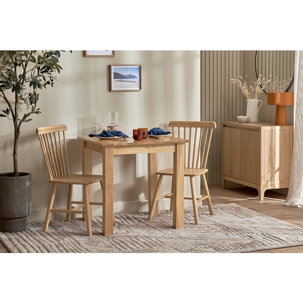 Hudson Natural Oak Square Dining Table + 2 Kingham Natural Oak Spindle Chairs 1