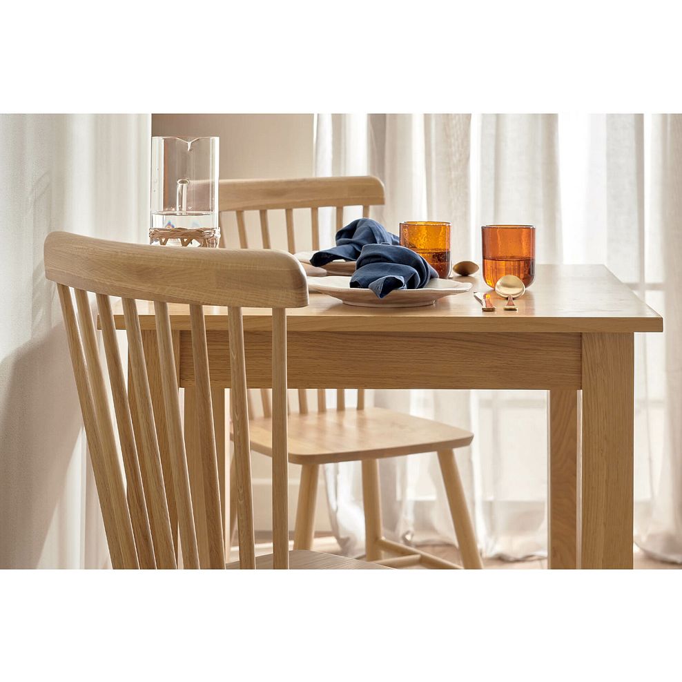 Hudson Natural Oak Square Dining Table + 2 Kingham Natural Oak Spindle Chairs 2