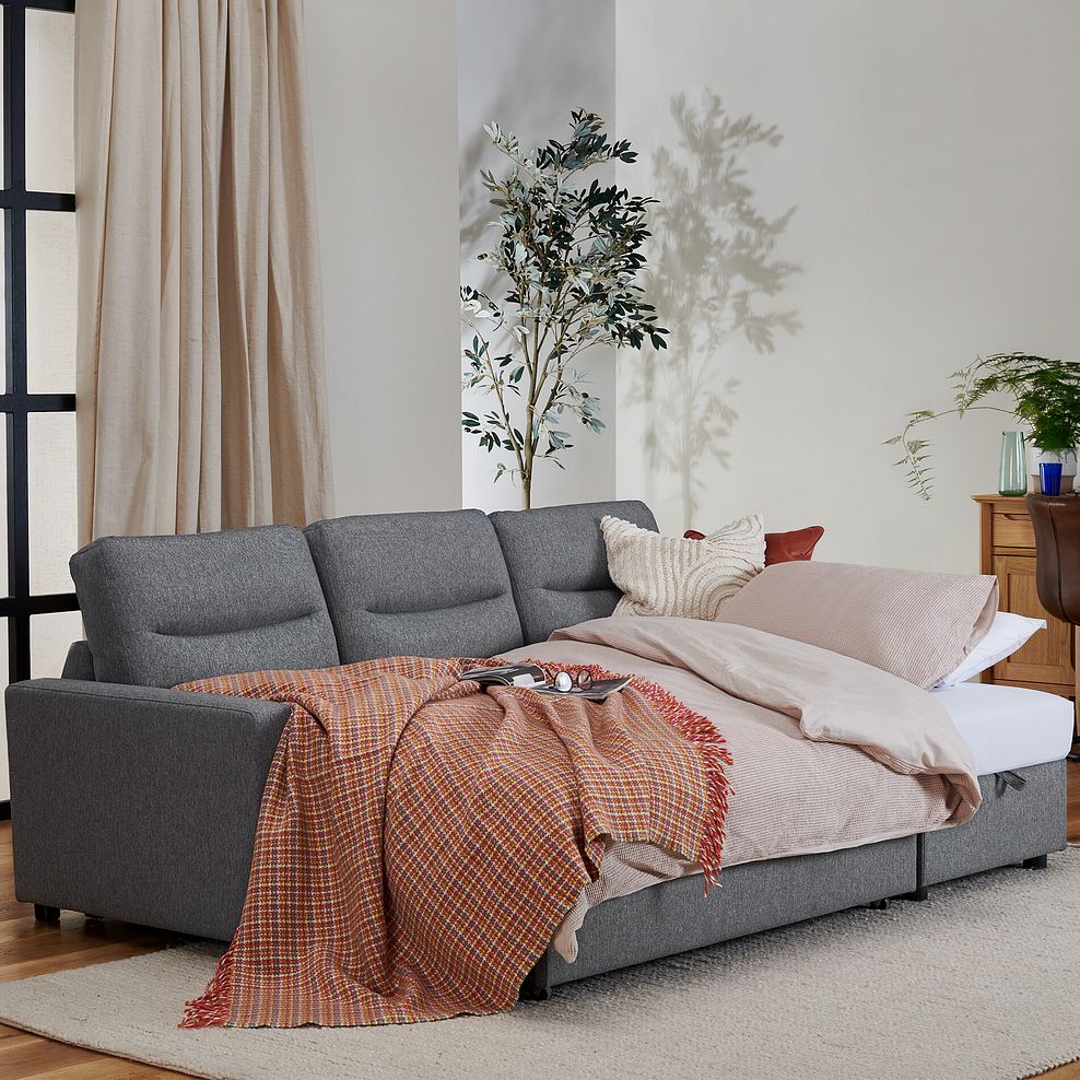 Kip 3 Seater Chaise Sofa Bed in Charcoal Fabric 1
