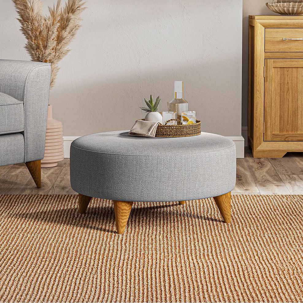 Levi Round Footstool in Barley Silver Fabric 1