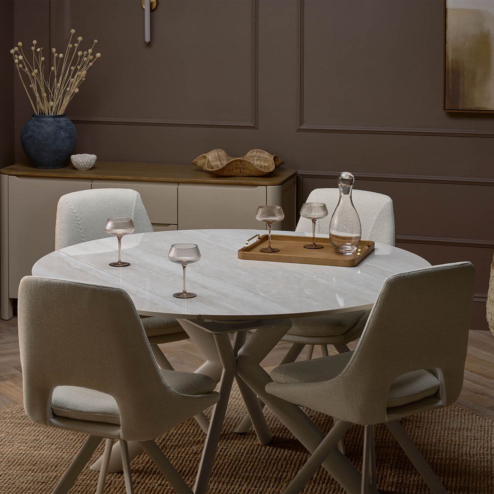 Lucia Ceramic Round Dining Table with 4 Nico Swivel Dining Chairs in Cream with Cappuccino Metal Legs 1